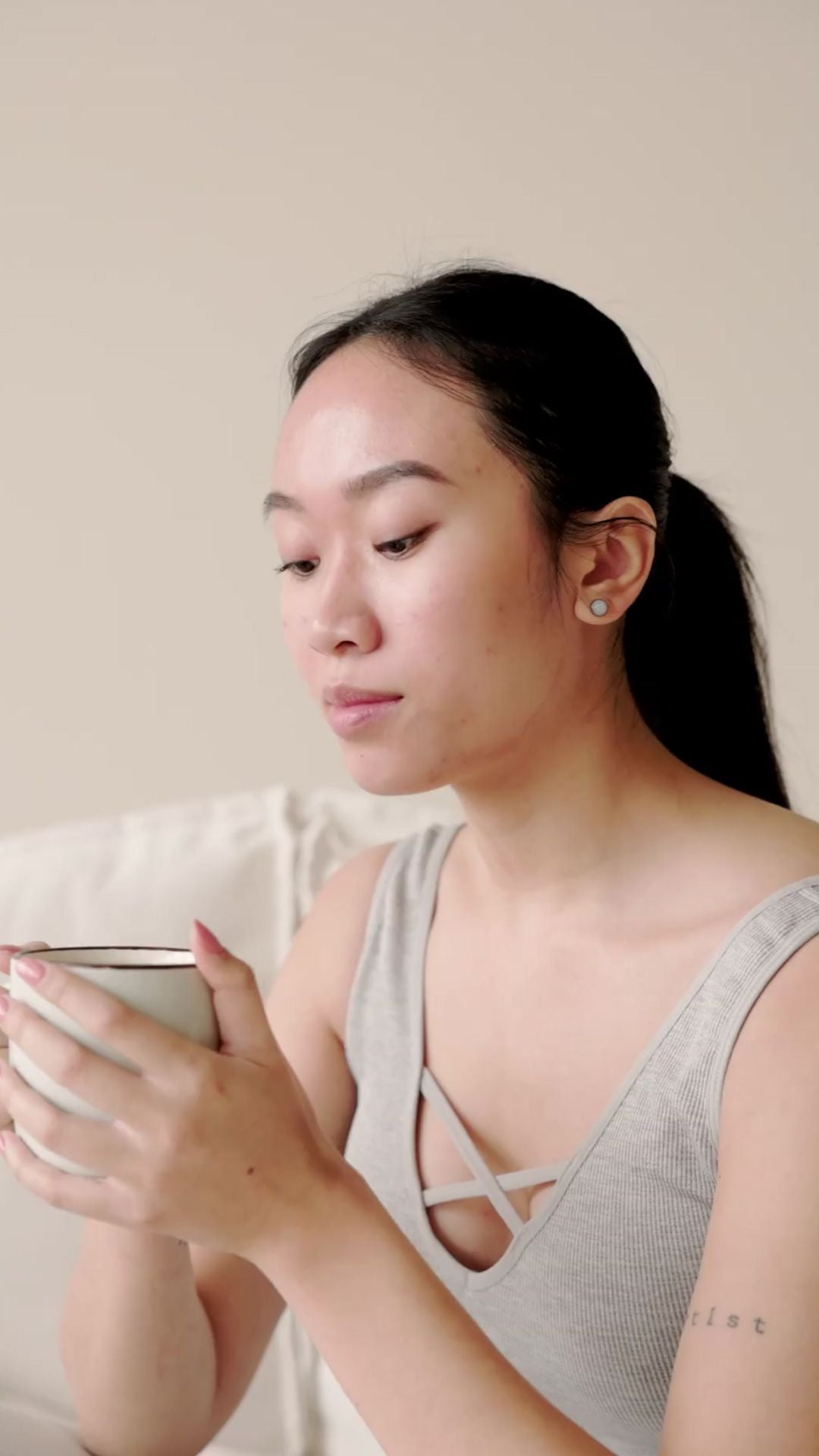 woman holding mug taking a moment for self care