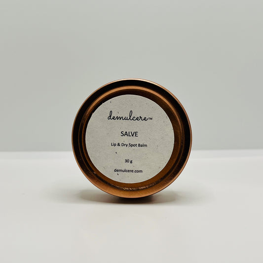 30g balm in round rose gold tin on white background